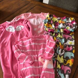 Carter’s footed pajamas. 4 pairs girls size 24mo/2yr